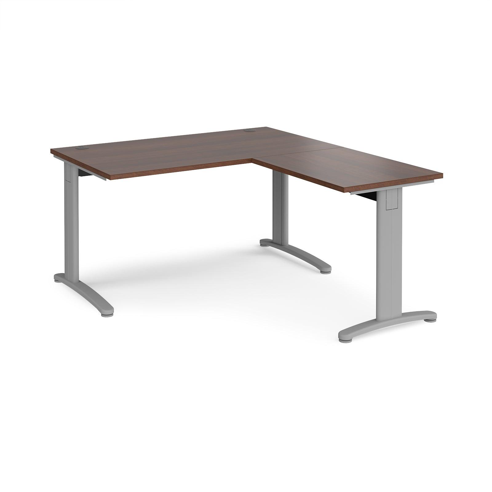 a desk with a wooden top and silver legs