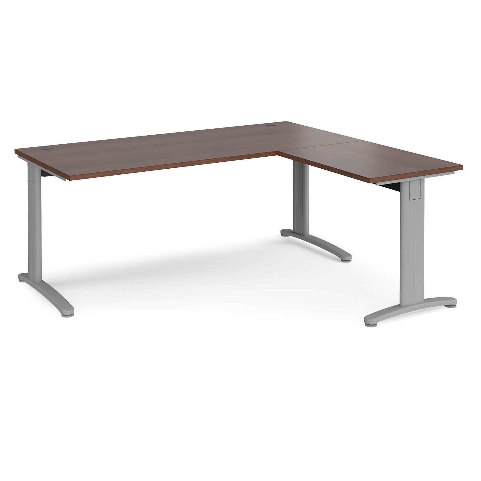 a desk with a wooden top and silver legs