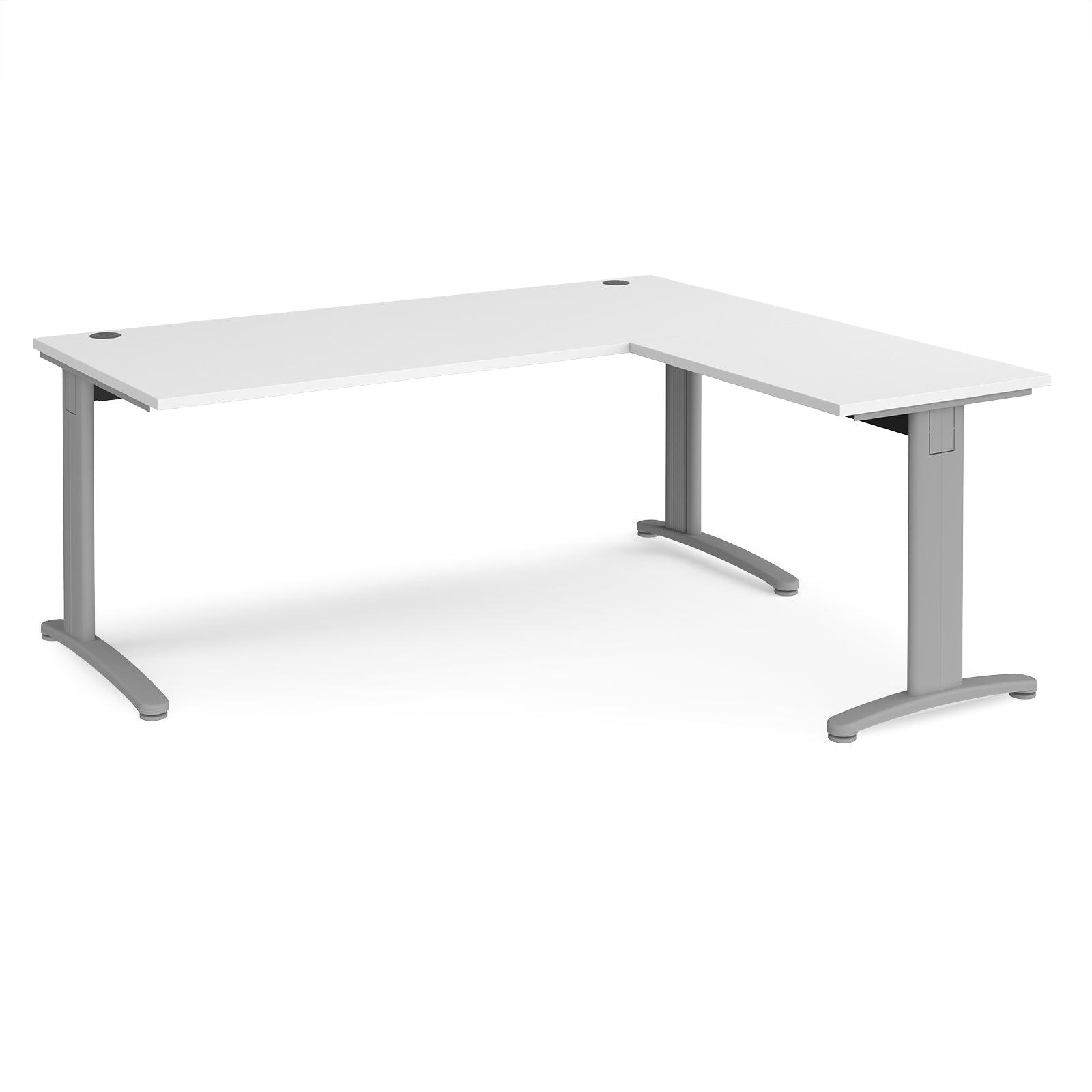 a white desk with a silver base