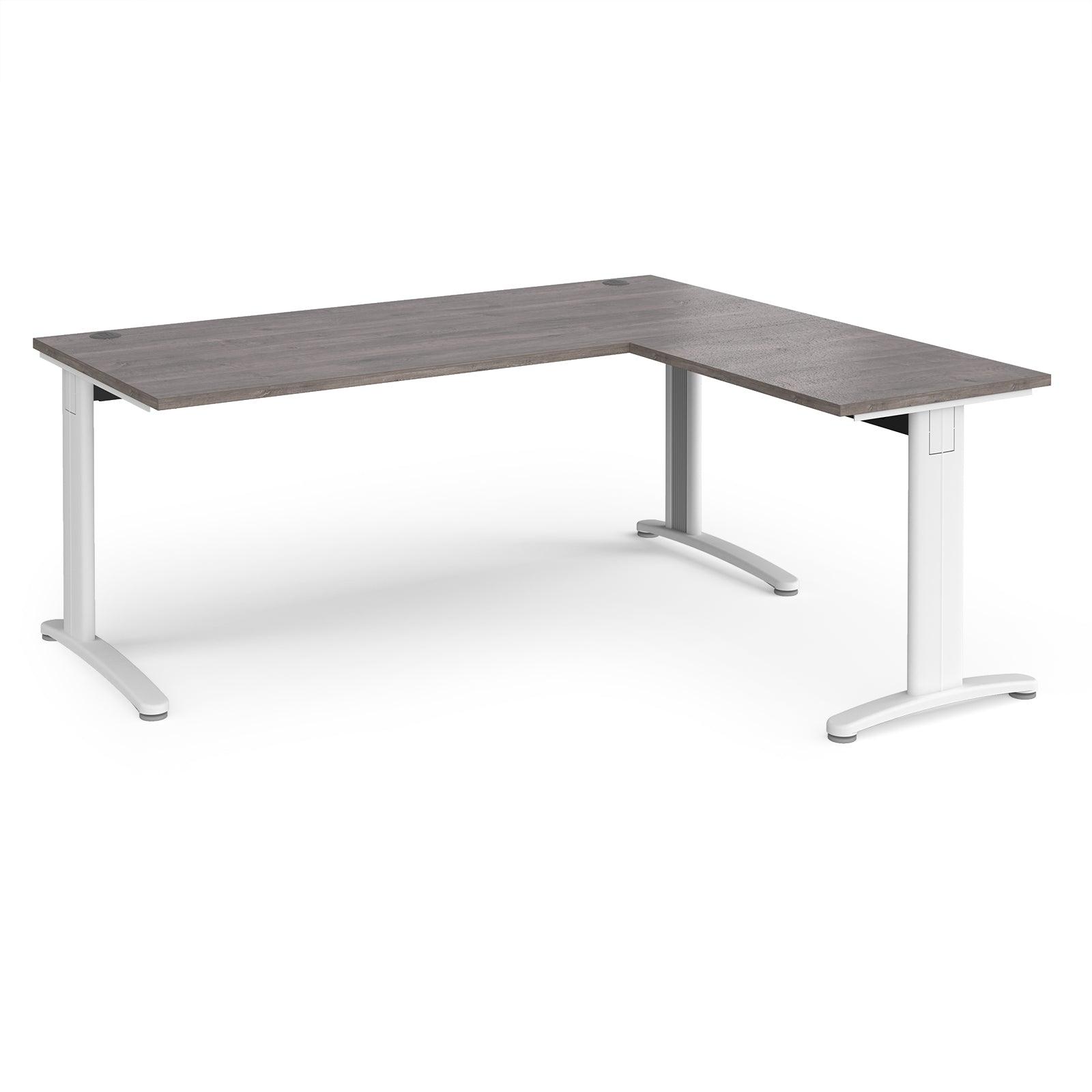 a desk with a white frame and a gray top